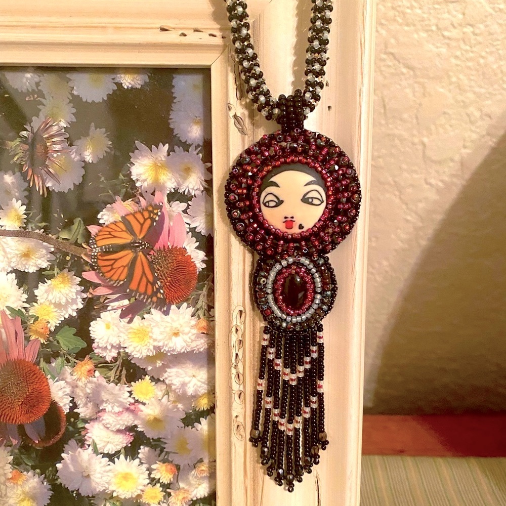 Hand beaded rope and button cabachon